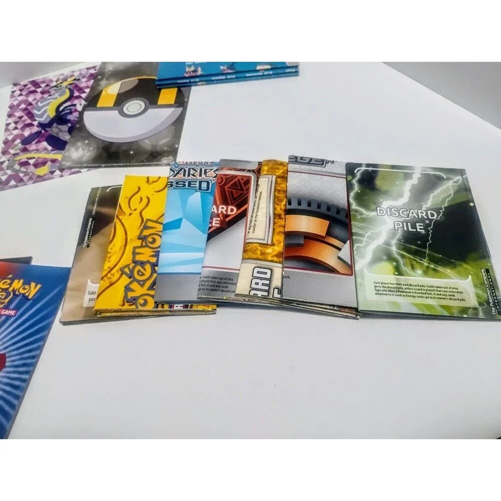 MASSIVE GAME FREAK POKEMON TCG CARD LIST RULEBOOK & PLAYMAT LOT W MORE